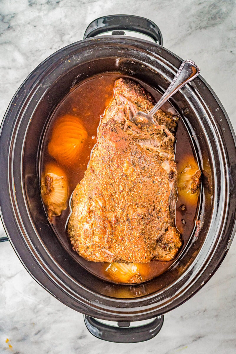 Slow Cooker Pulled Pork - The EASIEST recipe for pulled pork because your Crock-Pot does all the work for you! Set it and forget it for this AMAZING pulled pork that's super flavorful and so tender and juicy! Great for pulled pork sandwiches and tacos!