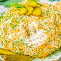 Dill Pickle Cheese Ball - Calling all dill pickle fans, this super EASY appetizer recipe is creamy, cheesy and chock full of dill pickles, dill pickle relish, and plenty of fresh dill! When you're looking for a fan FAVORITE recipe to serve at your next holiday party or event, backyard barbecue, picnic, or potluck, put this quick and simple recipe on the list!