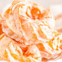 A plate of homemade French crullers (Dunkin' Donuts copycat recipe).