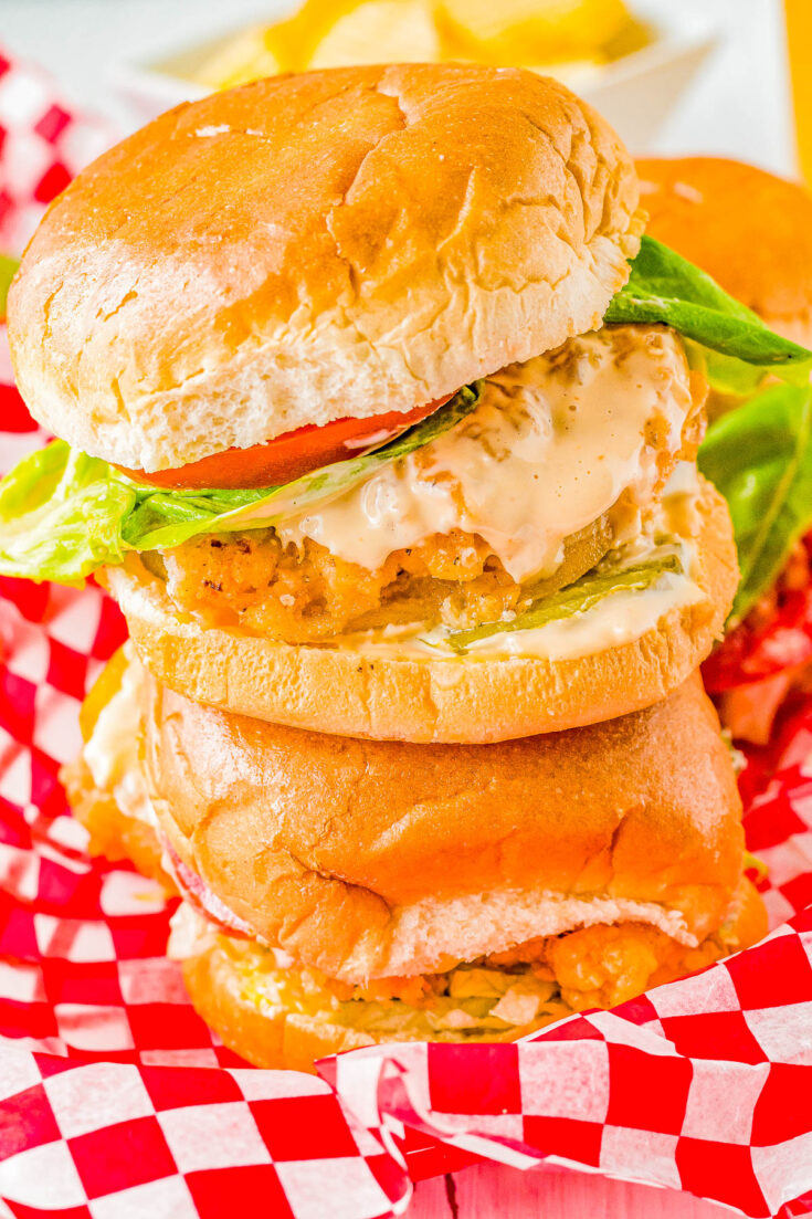 Crispy Chicken Sandwich - This EASY copycat Chick-Fil-A chicken sandwich has tender breaded and fried chicken that's crispy, crunchy, and perfectly juicy! The chicken is sandwiched in between toasted buns with a spicy mayo sauce just like the restaurant's! This is the ULTIMATE finger-lickin' good comfort food fried chicken sandwich recipe!