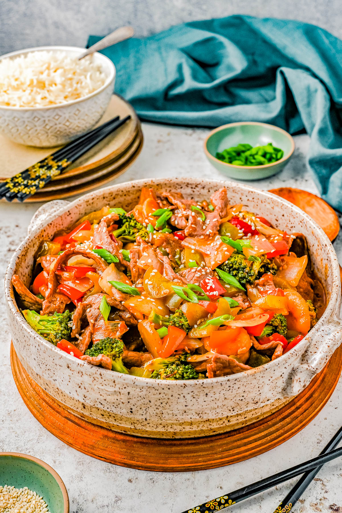 Easy Hunan Beef — Skip the takeout and make this popular Chinese-inspired recipe at home! Hunan-style beef is spicy, sweet, tangy, and loaded with tender slices of beef and veggies. Best of all, it’s ready in just 40 minutes! 