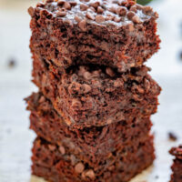 Zucchini Brownies - The BEST zucchini brownies that are EASY, made in one bowl, and no mixer required! Soft, fudgy, and almost taste like rich chocolate cake. They're filled and topped with mini chocolate chips to add even more fabulous chocolate flavor. And NO, you cannot taste the zucchini at all - promise!