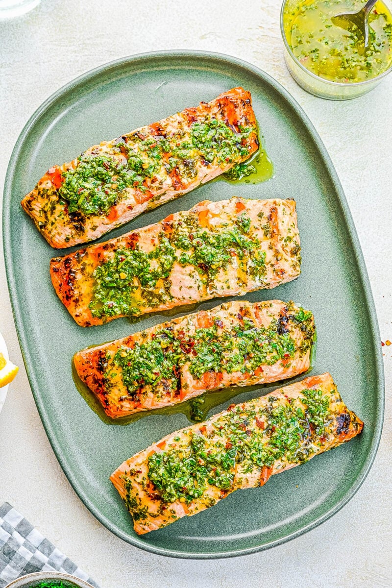 Grilled Chimichurri Sauce Salmon filets on a plate.