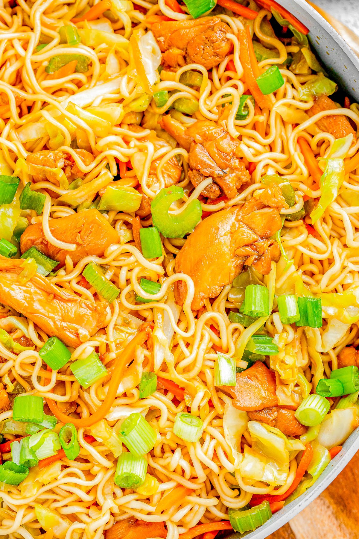 Chicken Chow Mein — Chewy chow mein noodles, crisp-tender veggies, and juicy chicken are stir-fried in a sesame-soy sauce! It’s a SIMPLE and FAST recipe that anyone can make. It's cheaper than ordering take out, your family will be impressed, and you'll love how EASY it is to prepare! 