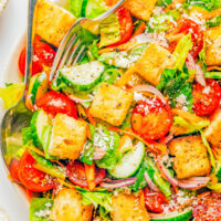 Classic House Salad - An EASY side salad recipe to serve with your favorite entree or alongside the main course! Made with common ingredients that you likely have already, but it's flexible and adaptable so you can ADD anything else you have on hand! The simple vinaigrette is easy, light, and flavorful but your favorite salad dressing also works.