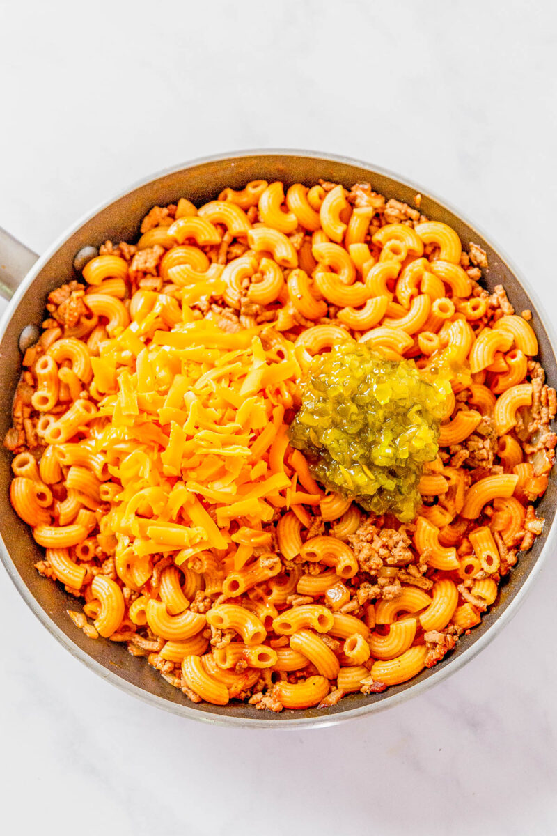 Homemade Hamburger Helper - You can kiss the store bought stuff goodbye because my homemade recipe for classic cheeseburger pasta is EASY, ready in 30 minutes, and made in ONE skillet! There's saucy cheesy pasta and juicy ground beef in every bite making this a family FAVORITE comfort food recipe. PERFECT for busy weeknights!