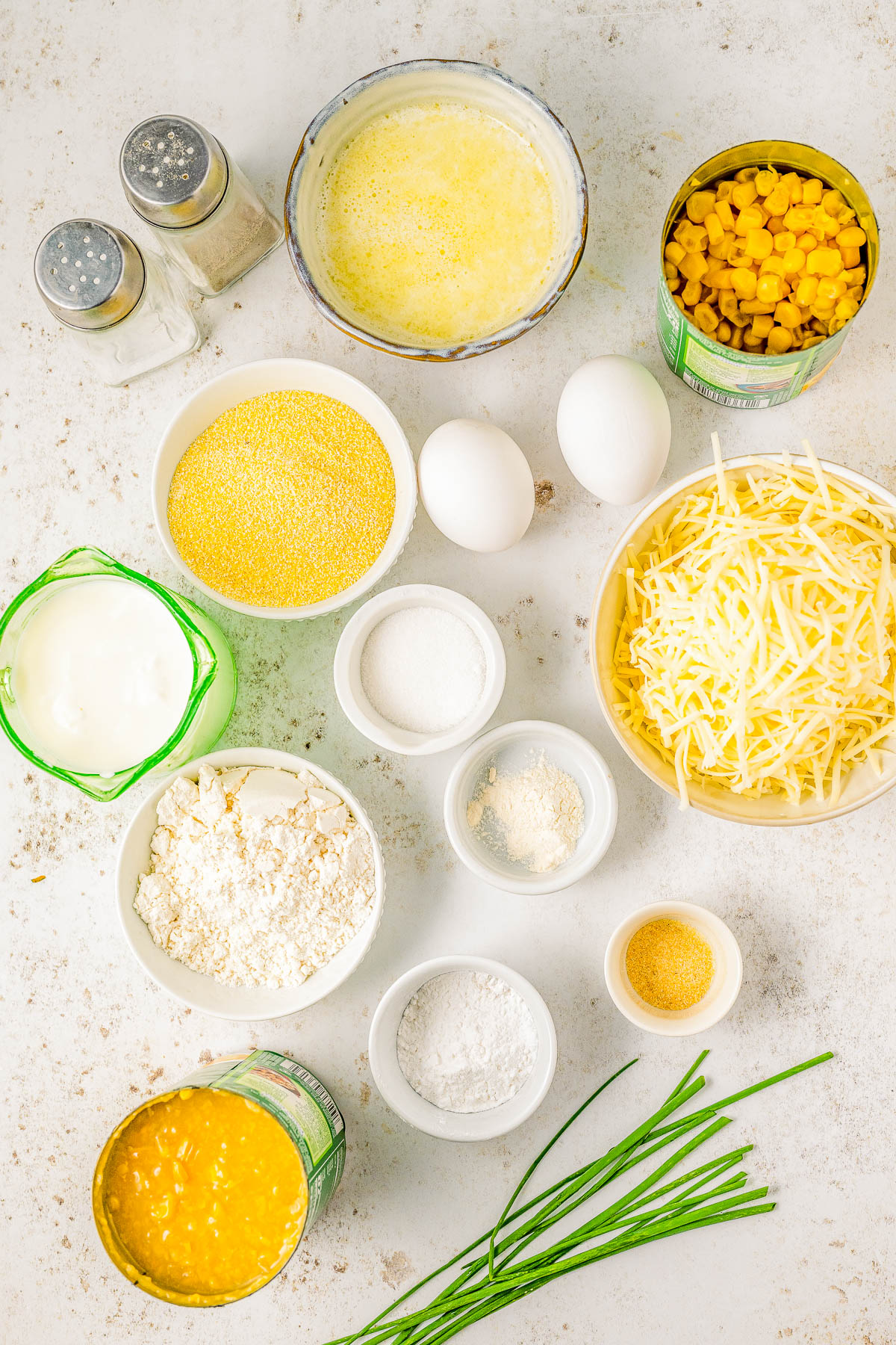Creamed Corn Casserole — The EASIEST holiday side dish you’ll ever make! This CREAMY, cheesy corn casserole is a simple stir-and-bake affair that can be made in advance! The texture is a cross between a souffle and cornbread. Slightly gooey, slightly firm, and pairs perfectly with your favorite Thanksgiving, Christmas, and Easter dishes!   
