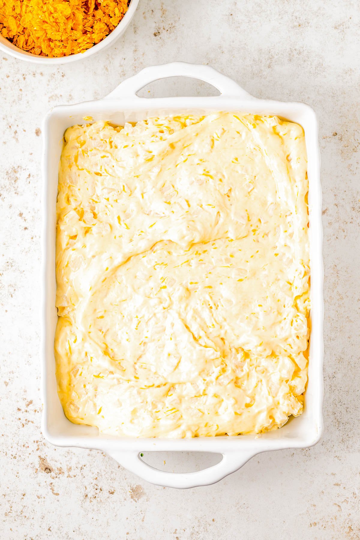 Cheesy Funeral Potatoes — This casserole is creamy, CHEESY, and topped with crunchy Corn Flakes! It’s an easy side dish that feeds a crowd, so it’s perfect for potlucks, holidays like Thanksgiving and Christmas, and family gatherings. Just 10 minutes of active prep time make this one of the EASIEST casseroles ever! No funeral luncheon required to enjoy this comfort food family favorite!