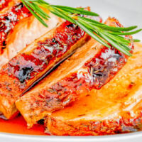 Glazed pork loin roast slices.