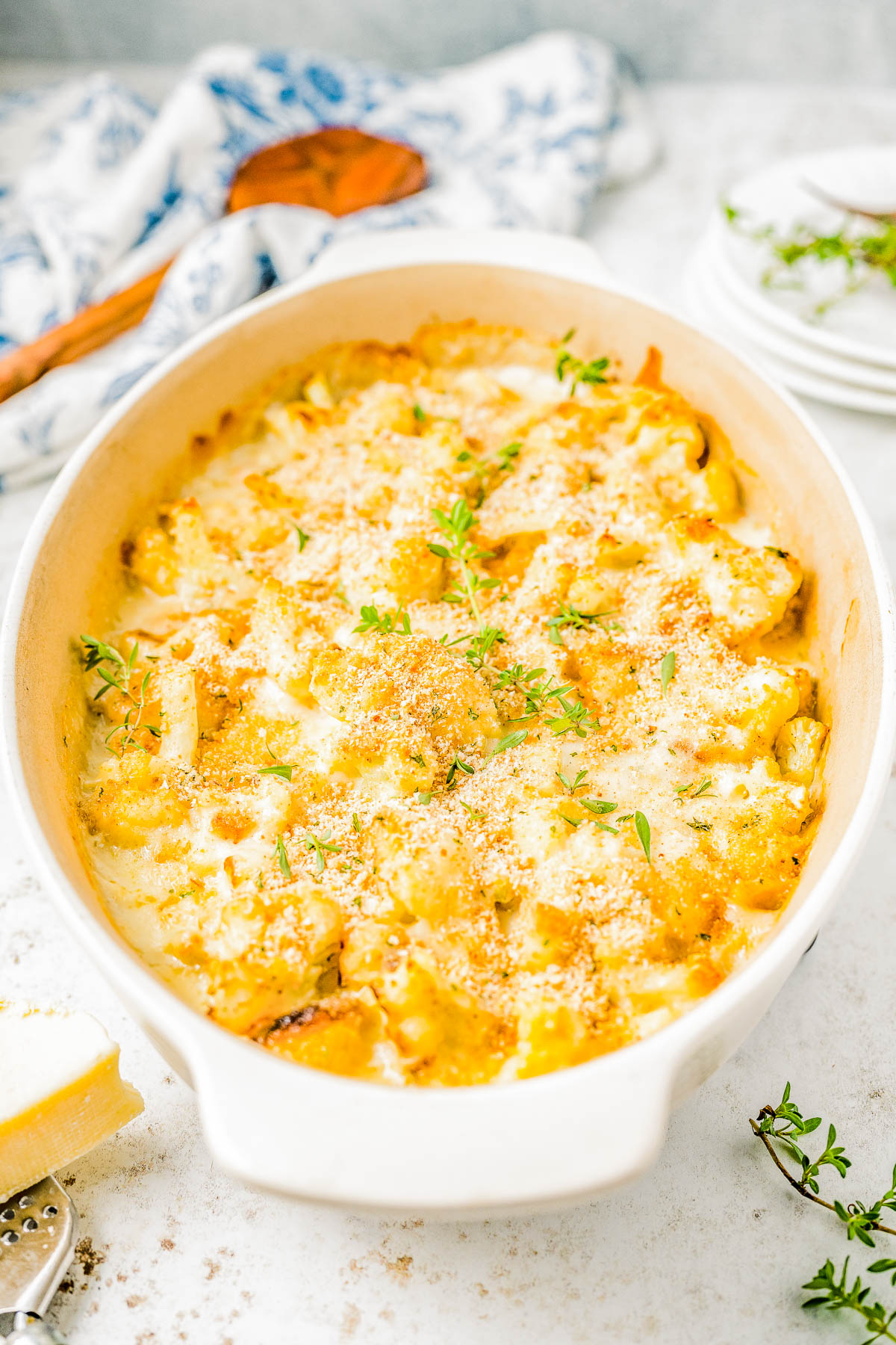 Cheesy Cauliflower Gratin — Cauliflower florets are coated in a creamy cheese sauce and sprinkled with a crispy panko breadcrumb topping before being baked to golden, bubbly perfection! This is an EASY yet ELEGANT side dish that’s perfect for busy weeknights and holiday meals alike including Thanksgiving, Christmas, or New Year's Eve! 