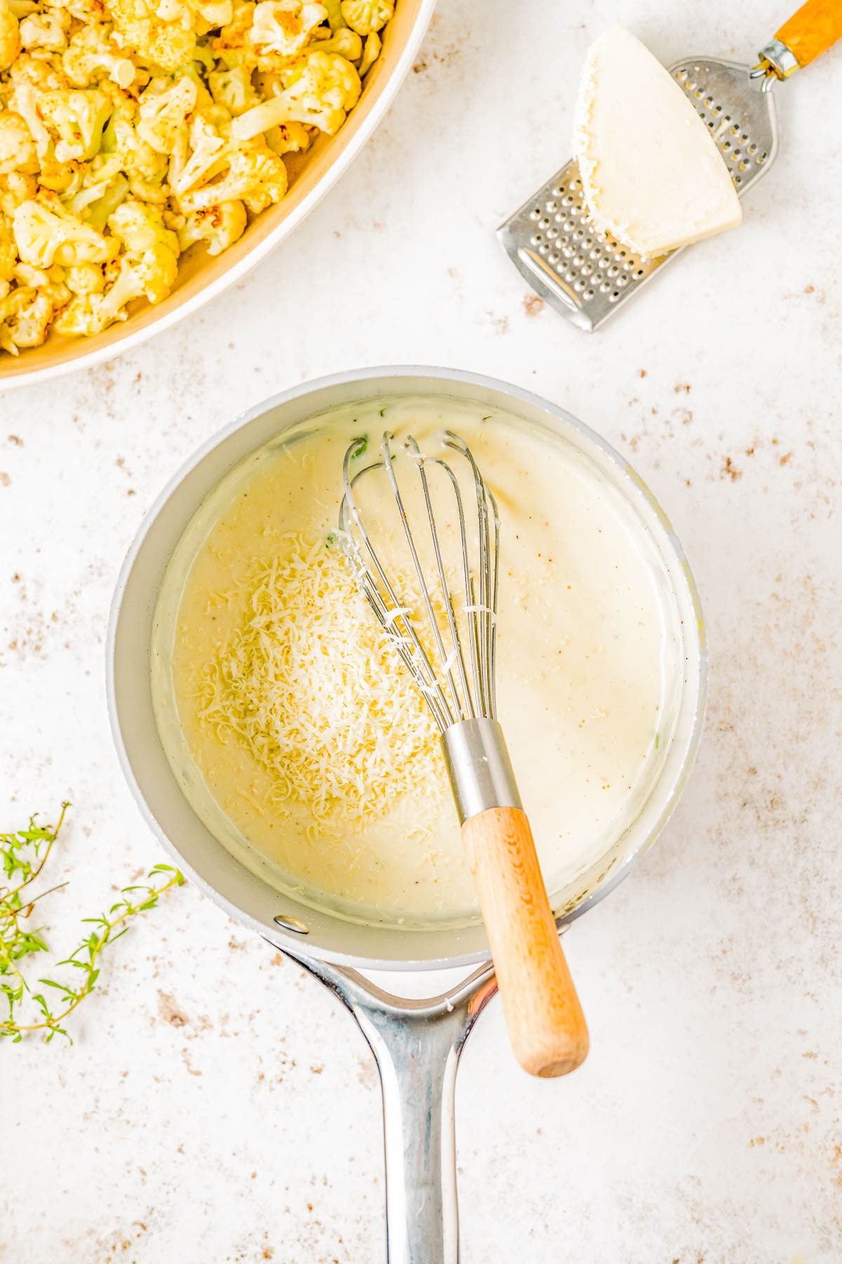 Cheesy Cauliflower Gratin — Cauliflower florets are coated in a creamy cheese sauce and sprinkled with a crispy panko breadcrumb topping before being baked to golden, bubbly perfection! This is an EASY yet ELEGANT side dish that’s perfect for busy weeknights and holiday meals alike including Thanksgiving, Christmas, or New Year's Eve!