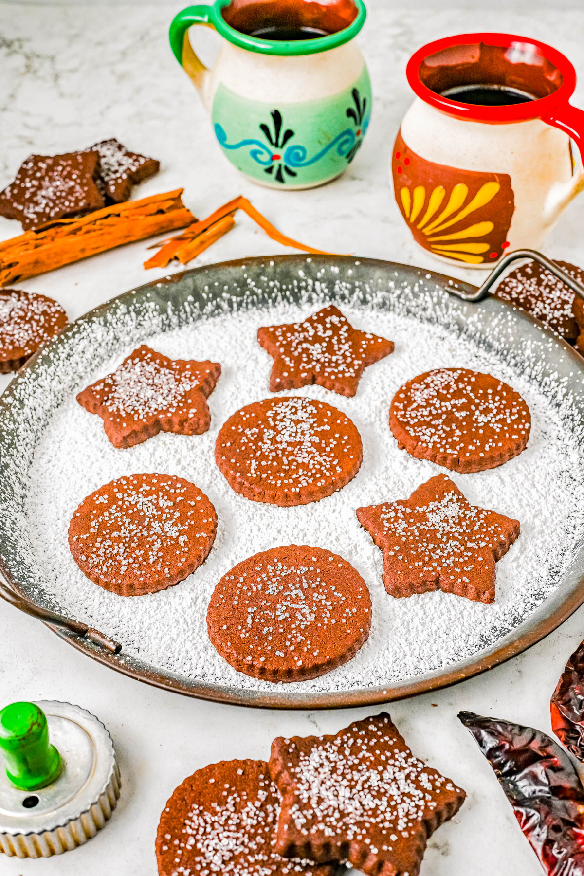 Mexican Chocolate Shortbread Cookies - These buttery shortbread cookies are full of chocolate, cinnamon-and-sugar, and a bit of spice thanks to a couple unique ingredients! They remind me of a good cup of Mexican hot chocolate, in cookie form. Great for cookie exchanges because they keep well and the perfect conversation piece cookie to set out at your next holiday party or fiesta! 