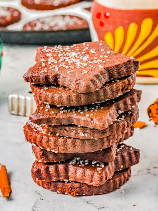 Mexican Chocolate Shortbread Cookies - These buttery shortbread cookies are full of chocolate, cinnamon-and-sugar, and a bit of spice thanks to a couple unique ingredients! They remind me of a good cup of Mexican hot chocolate, in cookie form. Great for cookie exchanges because they keep well and the perfect conversation piece cookie to set out at your next holiday party or fiesta!
