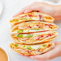 Thanksgiving Crunchwrap Supreme — Not sure what to do with all of those Thanksgiving leftovers? Turn them into Thanksgiving Crunchwraps! A soft flour tortilla and crunchy corn tostada base is piled high with your favorite Thanksgiving leftovers including turkey, mashed potatoes, stuffing, and more before sealing them, toasting, and dunking them in gravy. Leftovers never tasted so good!