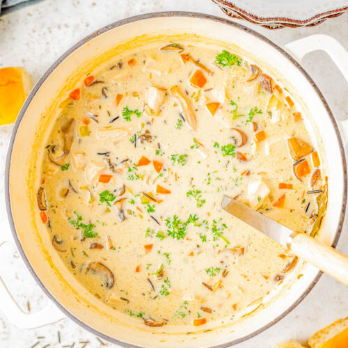 Turkey Wild Rice Soup - Take advantage of leftover holiday turkey, and make this rich, creamy, and very hearty soup! Made with an array of vegetables, seasonings and herbs, and of course plenty of wild rice and turkey! EASY, ready in an hour, and made in one pot! No turkey? Use leftover or rotisserie chicken. Comfort food the whole family will love especially when the weather is chilly!