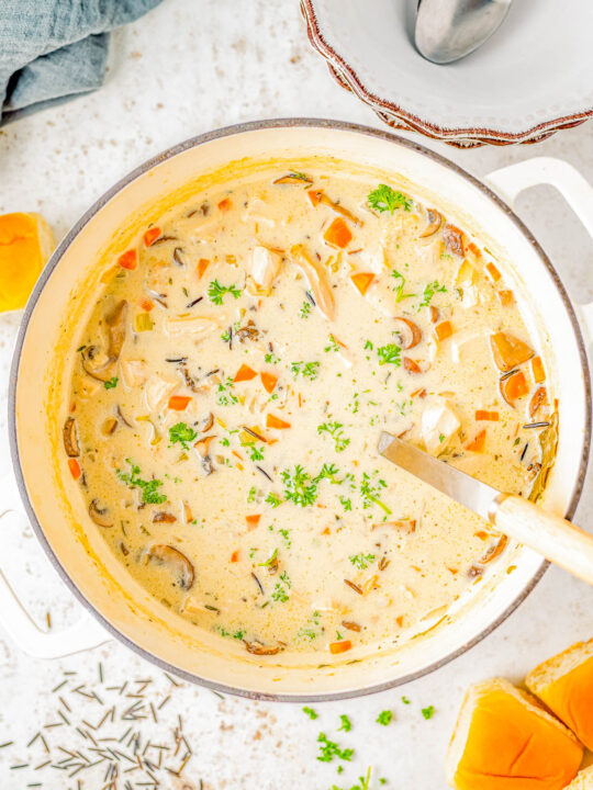 Turkey Wild Rice Soup - Take advantage of leftover holiday turkey, and make this rich, creamy, and very hearty soup! Made with an array of vegetables, seasonings and herbs, and of course plenty of wild rice and turkey! EASY, ready in an hour, and made in one pot! No turkey? Use leftover or rotisserie chicken. Comfort food the whole family will love especially when the weather is chilly!