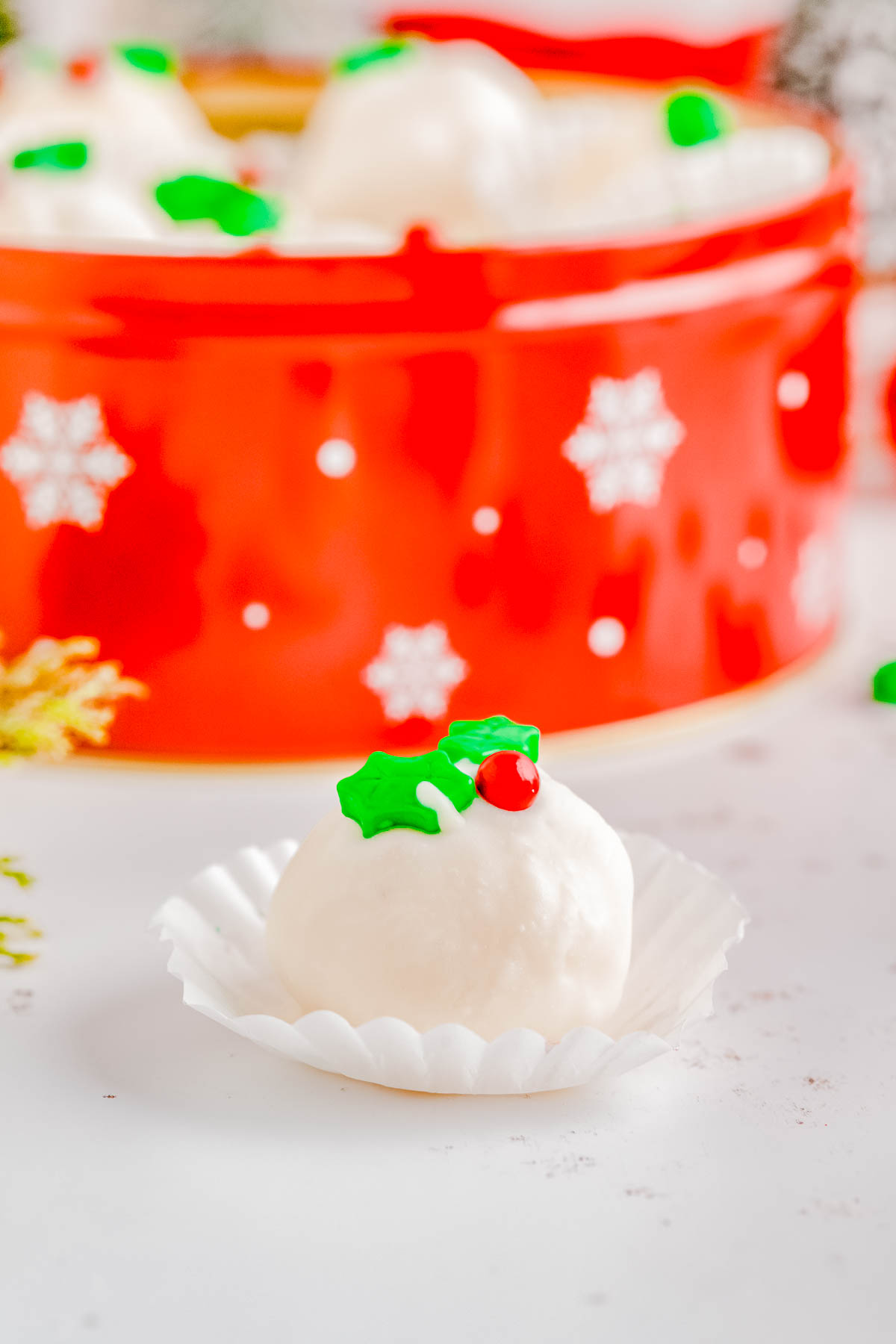 White Chocolate Truffles - Made with real butter, heavy cream, and a double dose of white chocolate in both the filling and the coating, these EASY truffles are CREAMY, decadent, and perfect for the holidays! Make this festive no-bake candy recipe for your next Christmas party, holiday entertaining, gift them to a special friend, or bring them along as a hostess gift. Everyone will appreciate these decadent little treats!