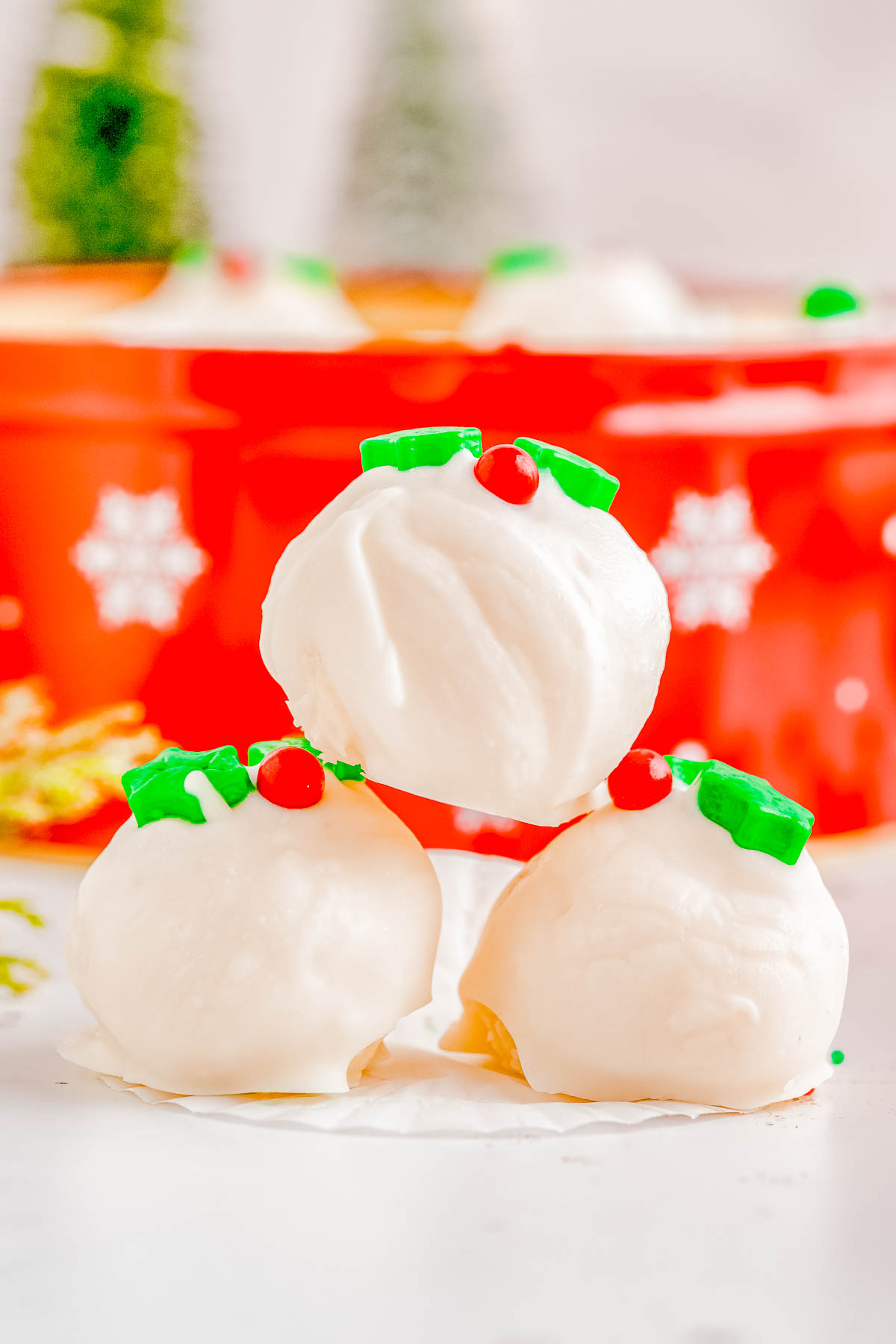 White Chocolate Truffles - Made with real butter, heavy cream, and a double dose of white chocolate in both the filling and the coating, these EASY truffles are CREAMY, decadent, and perfect for the holidays! Make this festive no-bake candy recipe for your next Christmas party, holiday entertaining, gift them to a special friend, or bring them along as a hostess gift. Everyone will appreciate these decadent little treats! 