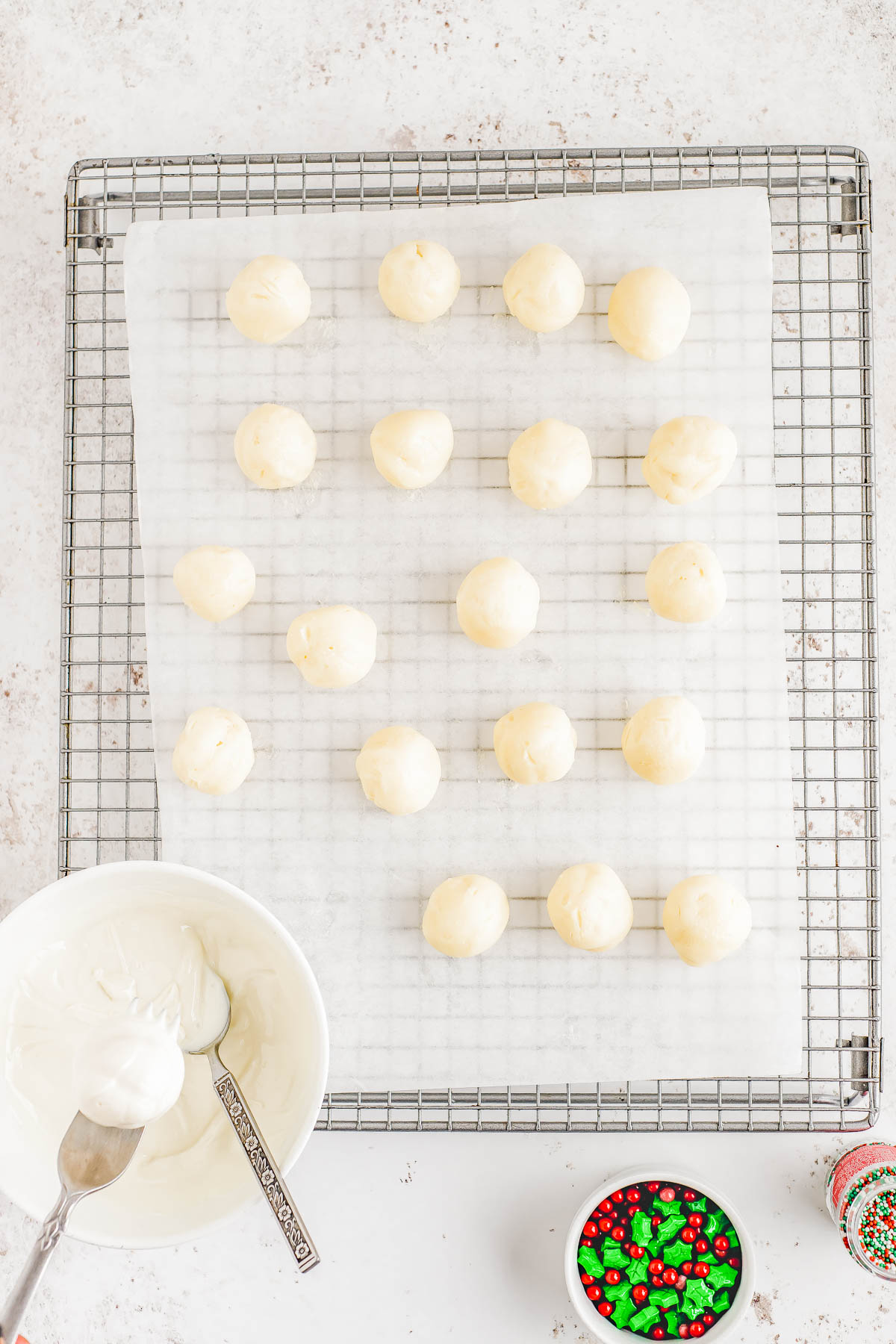White Chocolate Truffles - Made with real butter, heavy cream, and a double dose of white chocolate in both the filling and the coating, these EASY truffles are CREAMY, decadent, and perfect for the holidays! Make this festive no-bake candy recipe for your next Christmas party, holiday entertaining, gift them to a special friend, or bring them along as a hostess gift. Everyone will appreciate these decadent little treats!