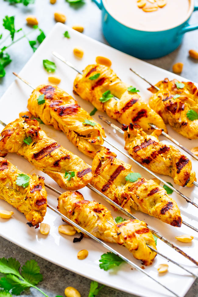 Easy Chicken Satay With Peanut Sauce on white serving platter