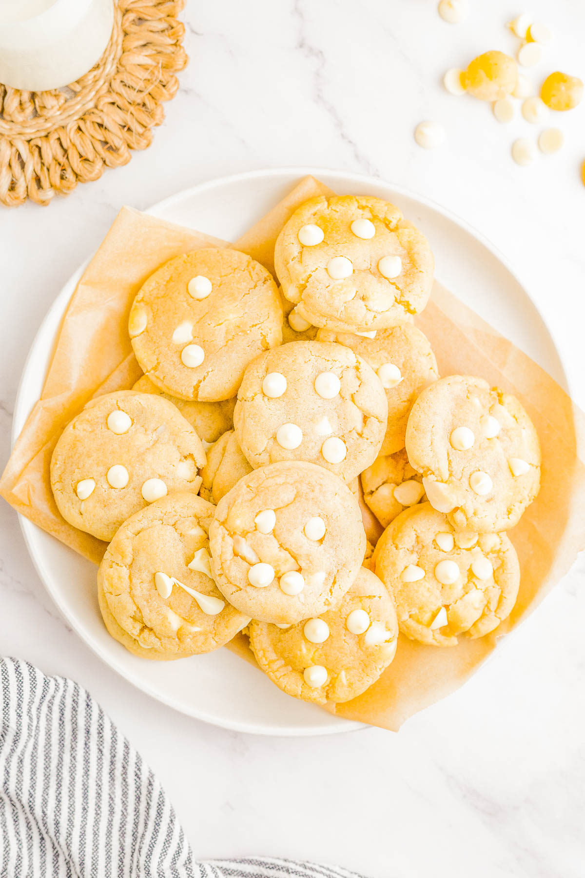 White Chocolate Macadamia Nut Cookies - These EASY white chocolate and macadamia nut cookies are the perfect combination of sweet, nutty, soft and chewy perfection! They're loaded with creamy white chocolate chips and crispy chunks of macadamia nuts and baked until slightly crisp on the outside with a perfectly soft and slightly chewy center. Learn how to make these cookies that are BETTER than from a bakery! 