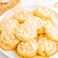 White Chocolate Macadamia Nut Cookies - These EASY white chocolate and macadamia nut cookies are the perfect combination of sweet, nutty, soft and chewy perfection! They're loaded with creamy white chocolate chips and crispy chunks of macadamia nuts and baked until slightly crisp on the outside with a perfectly soft and slightly chewy center. Learn how to make these cookies that are BETTER than from a bakery!