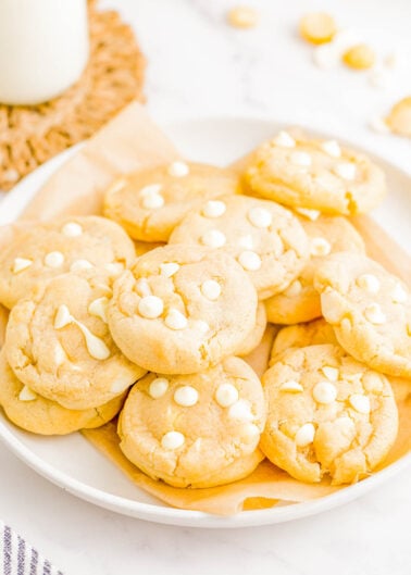 White Chocolate Macadamia Nut Cookies - These EASY white chocolate and macadamia nut cookies are the perfect combination of sweet, nutty, soft and chewy perfection! They're loaded with creamy white chocolate chips and crispy chunks of macadamia nuts and baked until slightly crisp on the outside with a perfectly soft and slightly chewy center. Learn how to make these cookies that are BETTER than from a bakery!