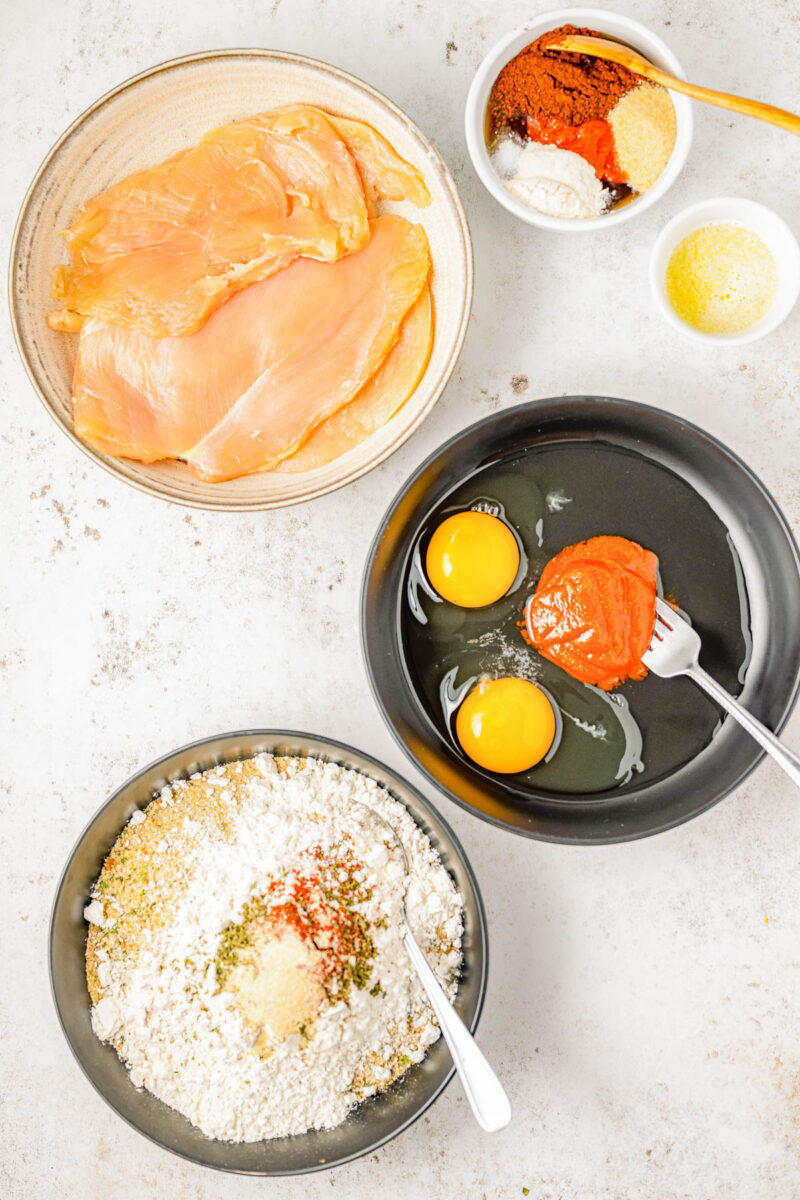 Air Fryer Hot Honey Chicken — Breaded chicken cutlets are air fried until crispy, then drizzled with spicy-sweet hot honey! This is such a QUICK and EASY air fryer chicken recipe that takes less than 30 minutes to prepare! Oven-baking instructions are also provided.
