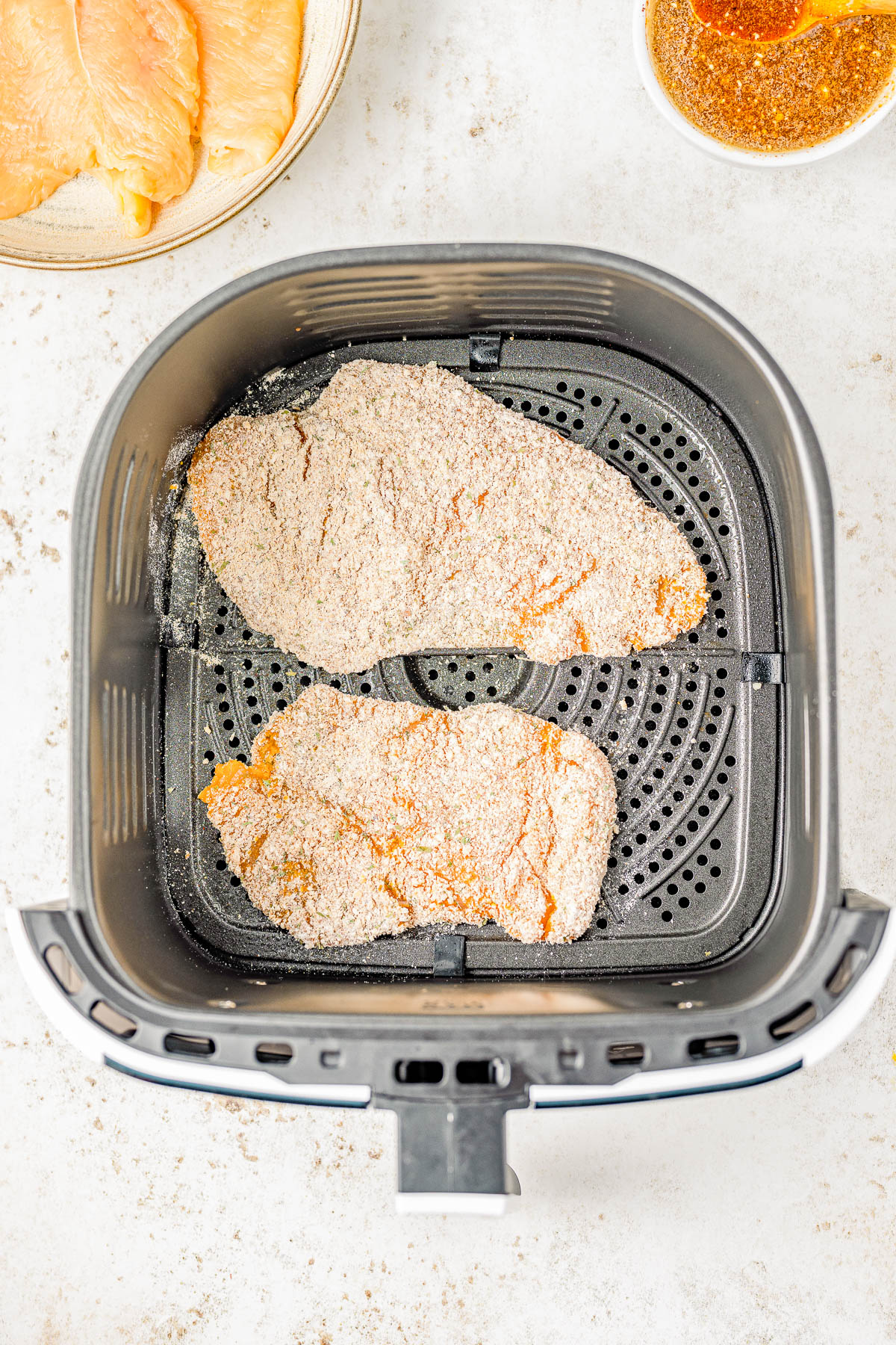 Air Fryer Hot Honey Chicken — Breaded chicken cutlets are air fried until crispy, then drizzled with spicy-sweet hot honey! This is such a QUICK and EASY air fryer chicken recipe that takes less than 30 minutes to prepare! Oven-baking instructions are also provided.