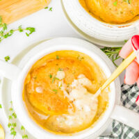 Biscuit and Sausage Gravy Pots — Individual ramekins are filled with homemade sausage gravy and topped with homemade flaky cheese and herb biscuits before being baked and served piping hot! Biscuits and gravy pots are an elevated and more elegant way to serve this family FAVORITE comfort food for anything from brunch to family dinner! If you don’t have any ramekins, don’t worry, you can make this recipe without them.