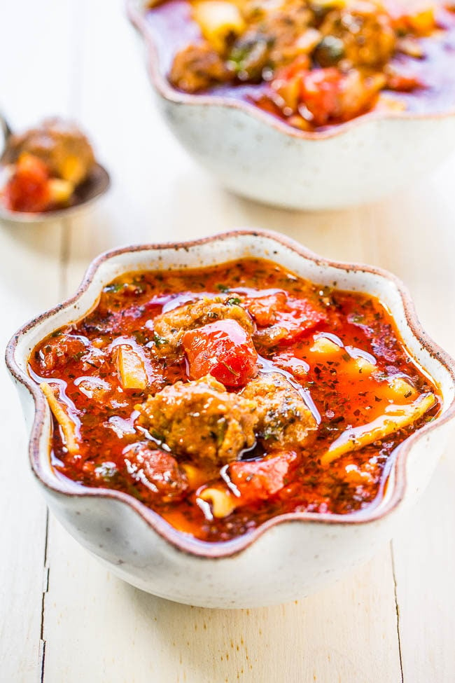 The Best 30-Minute Lasagna Soup - All the flavor of lasagna minus the work!! Loaded with juicy tomatoes, sausage, and topped with melted cheese! Easy, hearty, comfort food that's perfect for busy weeknights!!