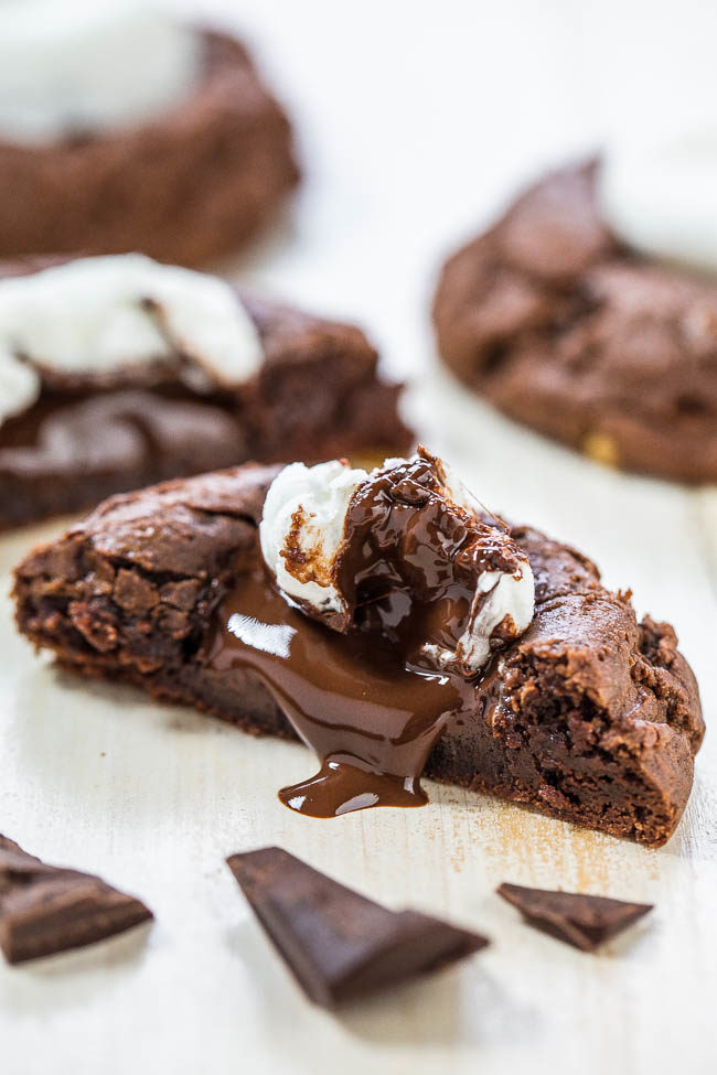 Hot Chocolate Cookies — These gooey hot chocolate cookies are complete with big gooey marshmallows and chunks of melted dark chocolate.