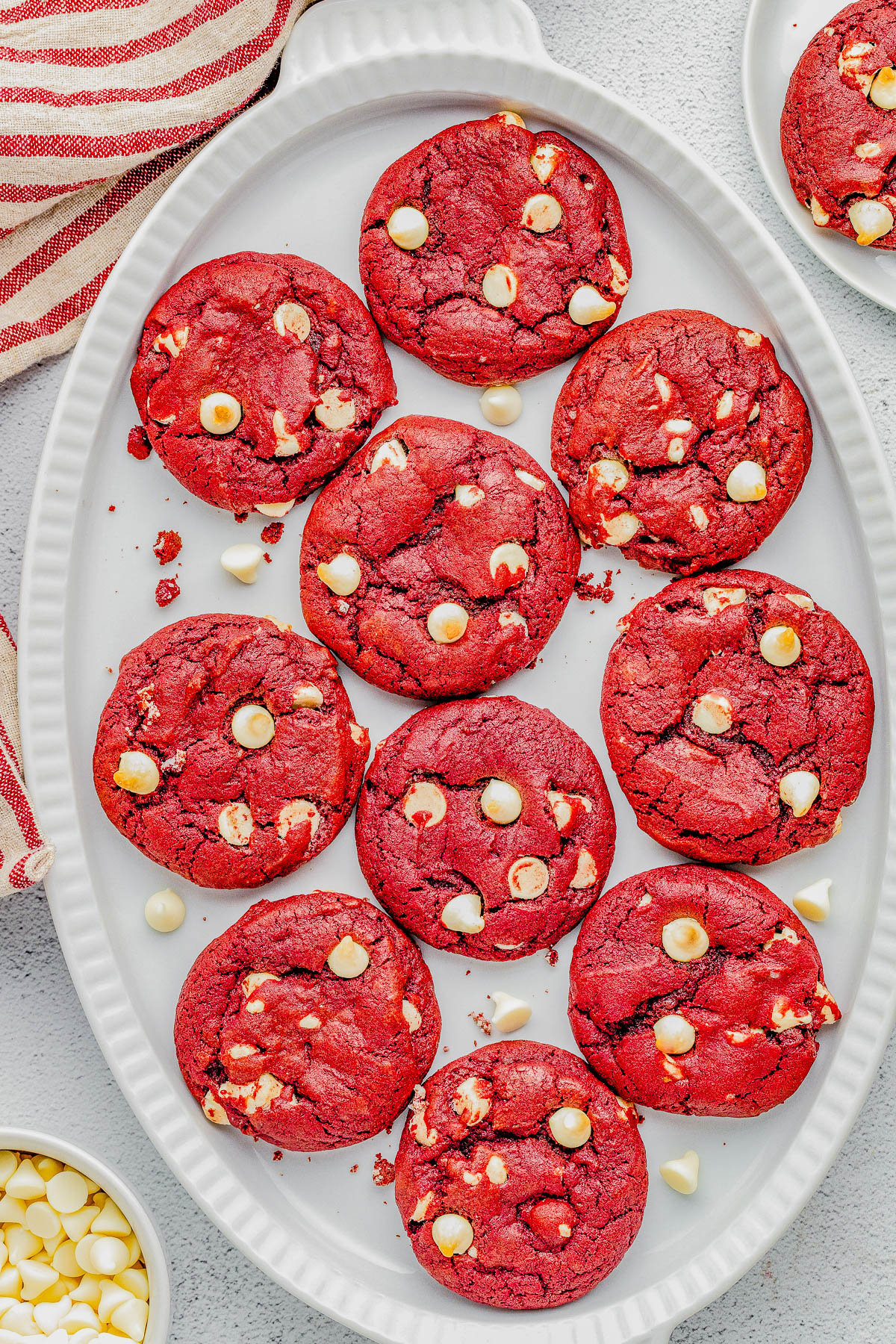 Red Velvet Cookies — Soft and chewy red velvet cookies that are loaded with white chocolate chips in every bite! A classic from-scratch red velvet cookie recipe that’s made in one bowl and EASY to make with PERFECT results every time! Perfect for Valentine’s Day, Christmas, or anytime you’re craving red velvet because these come together in no time and everyone LOVES them! 