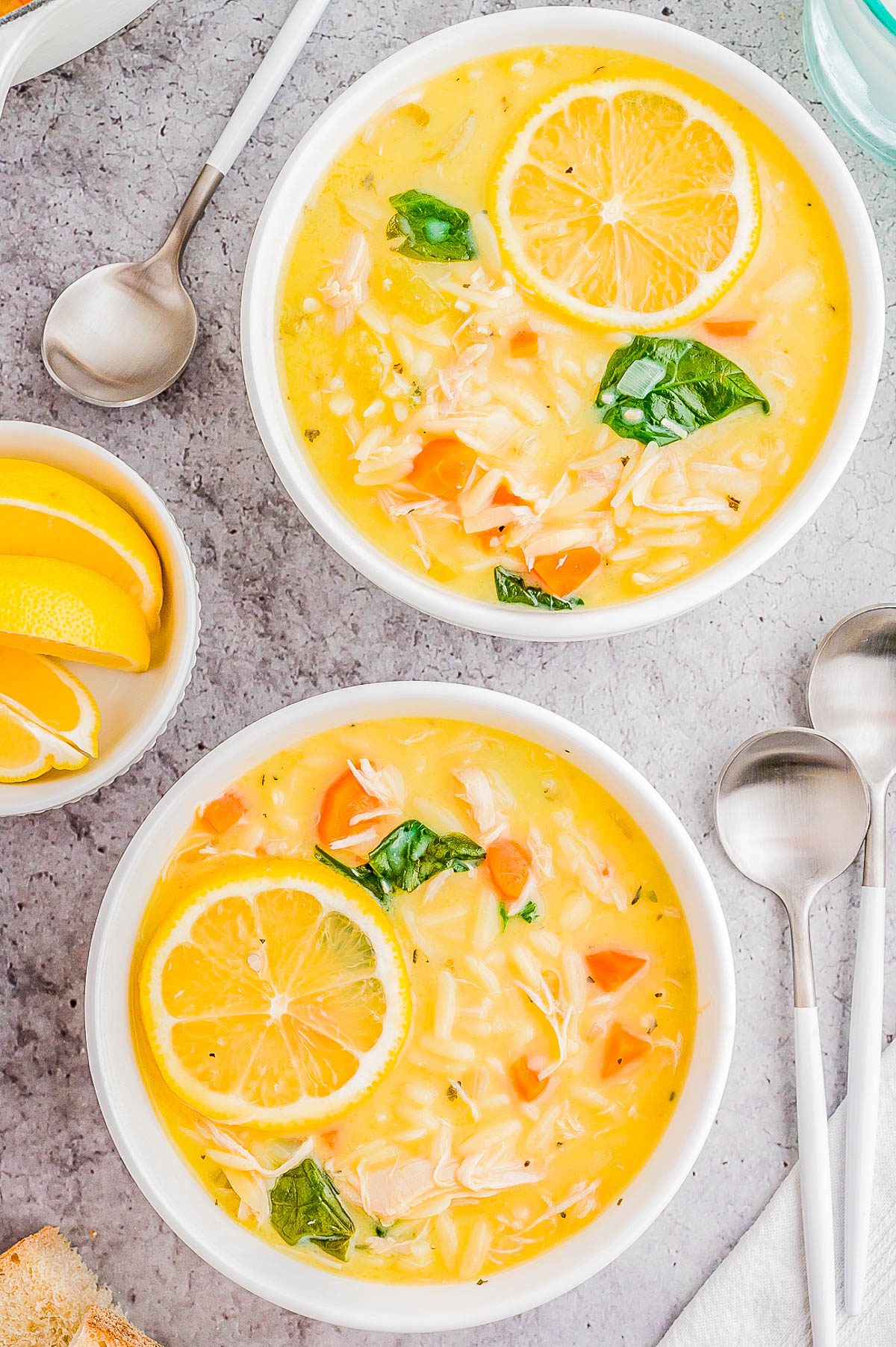 Lemon Chicken Soup - Learn to make this EASY Greek lemon chicken soup (avgolemono) at home! Made in one bowl and ready in just about 30 minutes, this creamy and comforting soup can be made with either orzo or rice. It's rich and luscious without being thick or heavy thanks to the burst of lovely fresh lemon flavor!