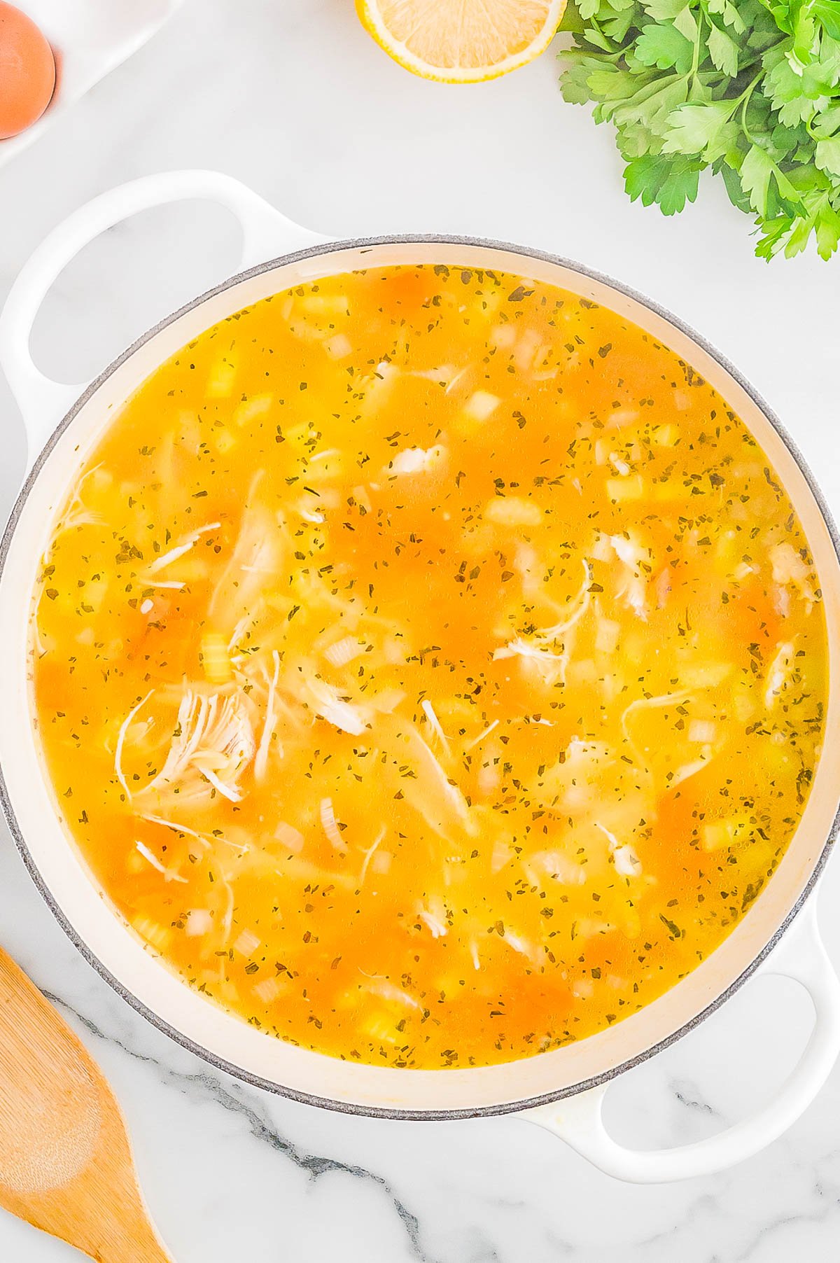 Lemon Chicken Soup - Learn to make this EASY Greek lemon chicken soup (avgolemono) at home! Made in one bowl and ready in just about 30 minutes, this creamy and comforting soup can be made with either orzo or rice. It's rich and luscious without being thick or heavy thanks to the burst of lovely fresh lemon flavor!