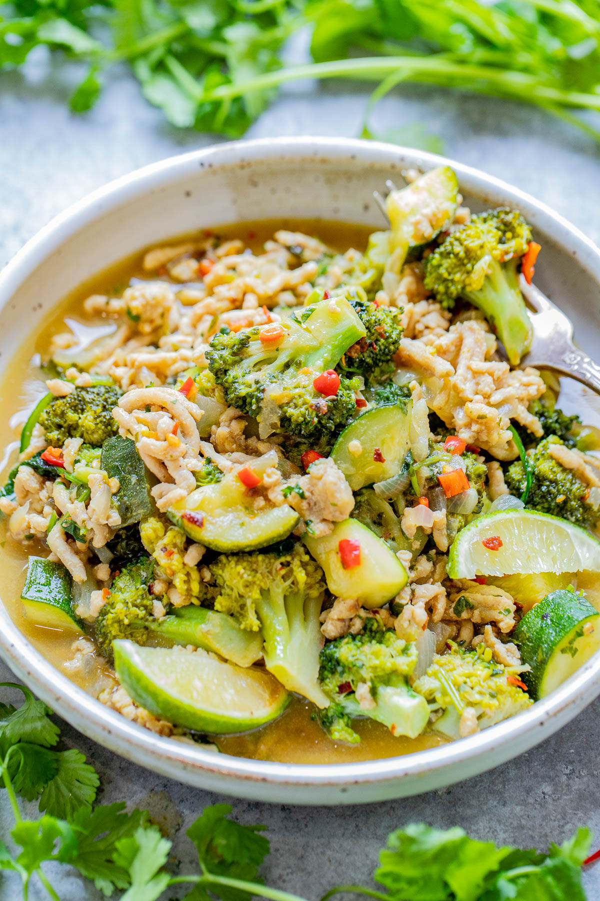 Ground Chicken Green Thai Curry - 💚 Skip takeout and make this EASY, one-skillet green curry with ground chicken and an array of healthy vegetables! Ready in under 30 minutes, great for busy weeknights, and tastes BETTER than from a Thai restaurant! Healthy yet hearty comfort food that tastes AMAZING and is naturally gluten-free.