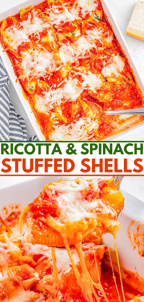 A dish of ricotta and spinach stuffed shells with melted cheese, served in a baking dish and being scooped with a fork.