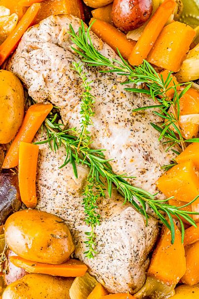 Slow Cooker Pork Loin - Tender, juicy pork loin is slow cooked with hearty vegetables for a complete and EASY meal! Reminiscent of a hearty and rustic recipe, yet fancy enough for a special dinner or holiday entertaining!