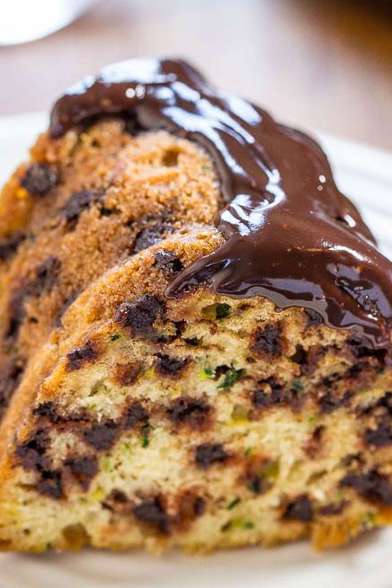 slice of chocolate chip zucchini bundt cake on white plate