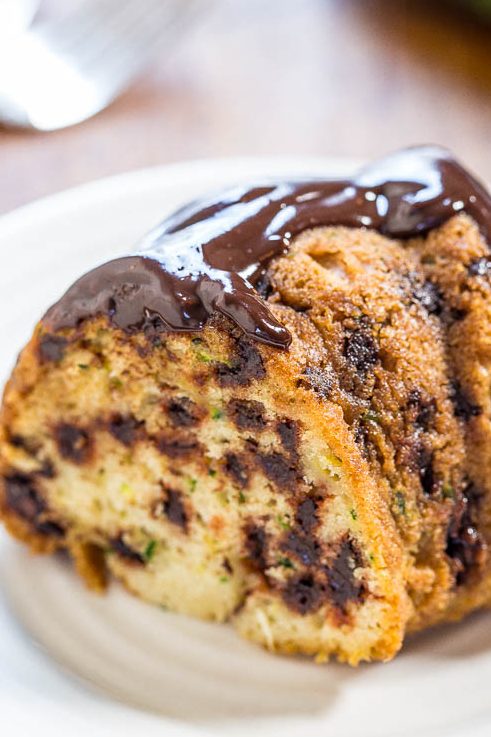 slice of chocolate chip zucchini bundt cake on white plate