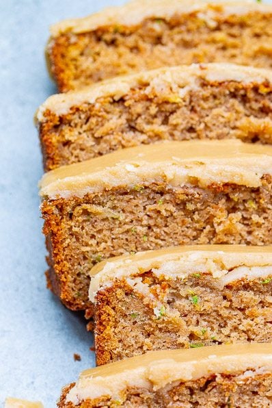 Apple Zucchini Bread with Brown Sugar Frosting - Super soft, moist, and topped with the BEST frosting ever!! One bowl, no mixer, EASY recipe for the best apple zucchini bread that everyone LOVES!!
