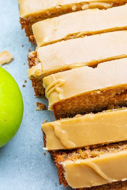 Apple Zucchini Bread with Brown Sugar Frosting - Super soft, moist, and topped with the BEST frosting ever!! One bowl, no mixer, EASY recipe for the best apple zucchini bread that everyone LOVES!!