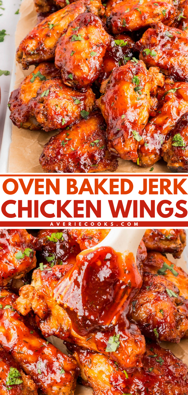 Oven-baked jerk chicken wings coated in a glossy sauce, garnished with chopped herbs, arranged on parchment paper.