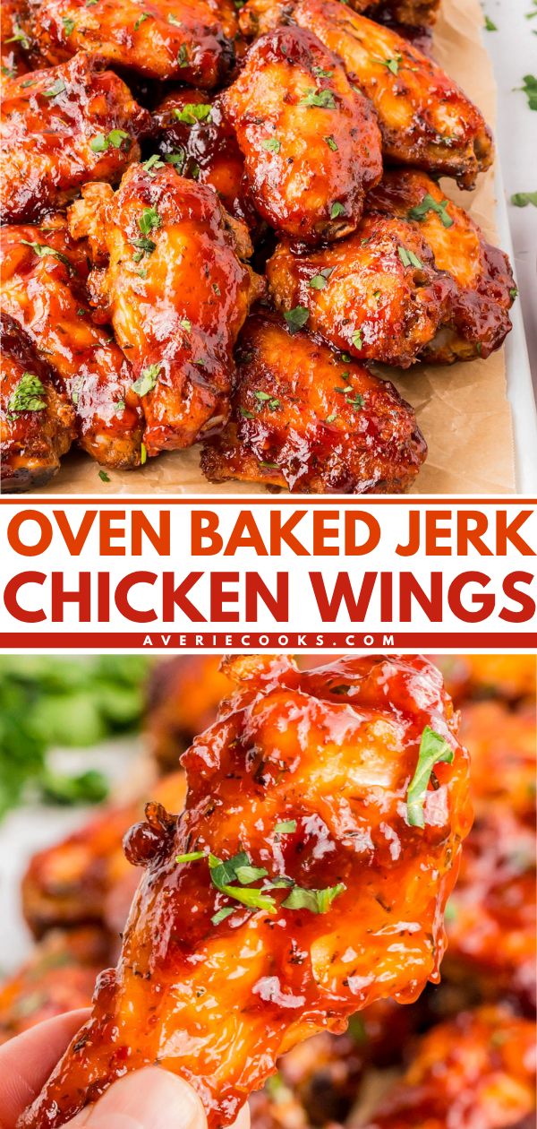 Close-up of glazed oven-baked jerk chicken wings garnished with herbs, displayed on parchment paper and being held up for a detailed view.