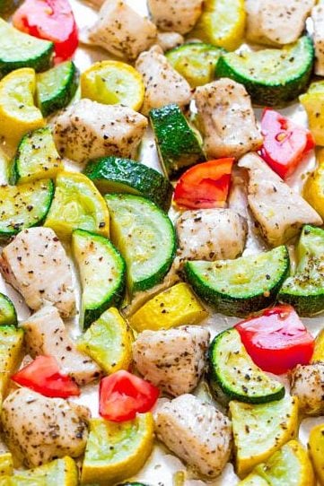 sheet pan chicken and veggies on countertop