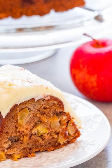 Fresh Apple Bundt Cake with Cream Cheese Frosting — An EASY, one-bowl, no-mixer apple cake that's to-die-for!! Loaded with juicy apples in every bite, perfectly spiced, and topped with tangy cream cheese frosting! So DELISH!!